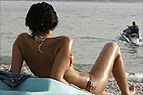 Scientists have developed tiny chip which can give three-month tan once implanted under the skin.