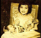Young SRK in his sister\'s lap