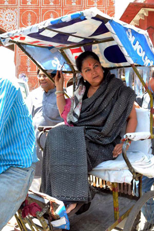 Today in pics: Vasundhra Raje on a rickshaw